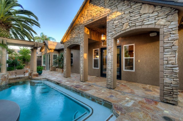 view of pool with a fenced in pool and a patio area