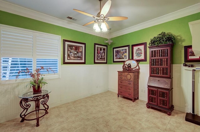 71 Omaha Ave, Clovis, CA 93619 - living area with a ceiling fan, wainscoting, and crown molding