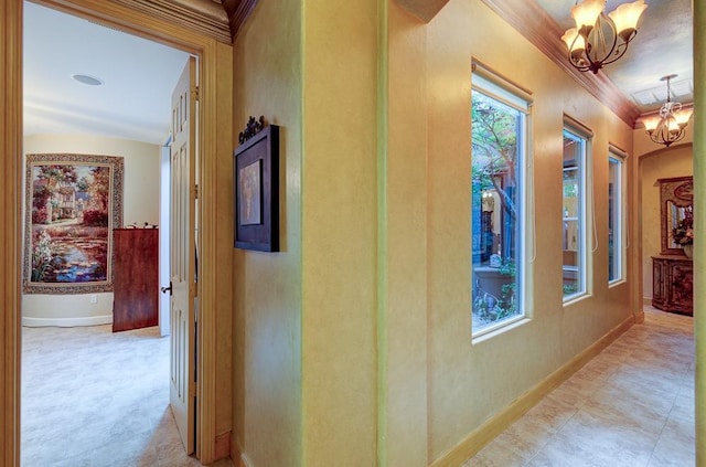 71 Omaha Ave, Clovis, CA 93619 - hall featuring a chandelier, crown molding, and baseboards
