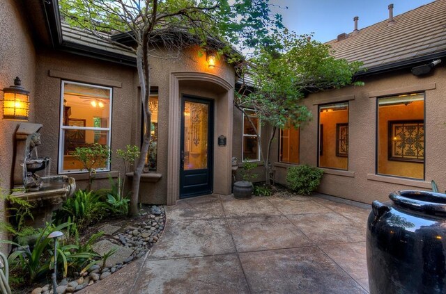 71 Omaha Ave, Clovis, CA 93619 - entrance to property with a patio and stucco siding