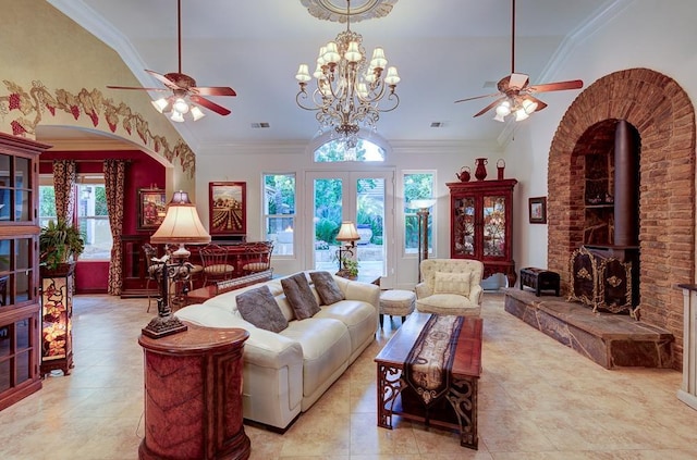 living area with ceiling fan, ornamental molding, light tile patterned flooring, and visible vents