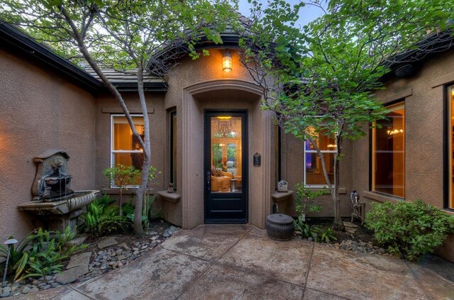 71 Omaha Ave, Clovis, CA 93619 - doorway to property featuring stucco siding