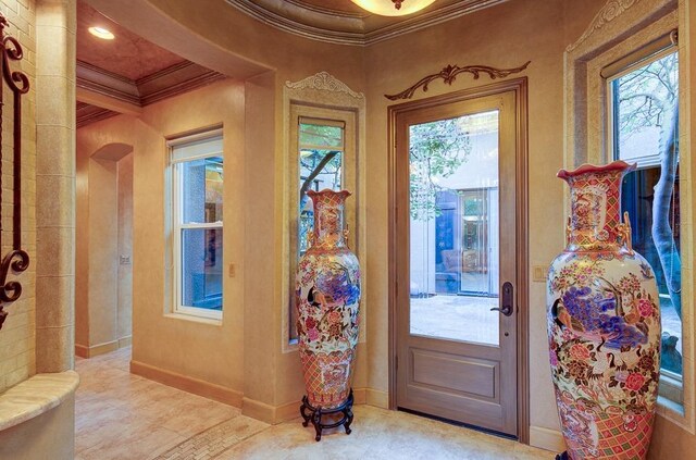 71 Omaha Ave, Clovis, CA 93619 - foyer with crown molding, light tile patterned flooring, and baseboards