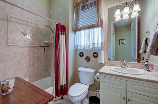 71 Omaha Ave, Clovis, CA 93619 - full bath with toilet, vanity, shower / bathtub combination with curtain, and a chandelier