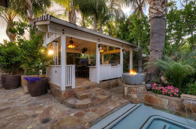 71 Omaha Ave, Clovis, CA 93619 - view of patio / terrace featuring a gazebo, a fire pit, and ceiling fan