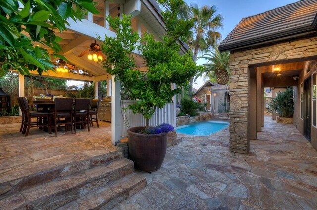 71 Omaha Ave, Clovis, CA 93619 - swimming pool featuring a patio, a gazebo, and outdoor dining space