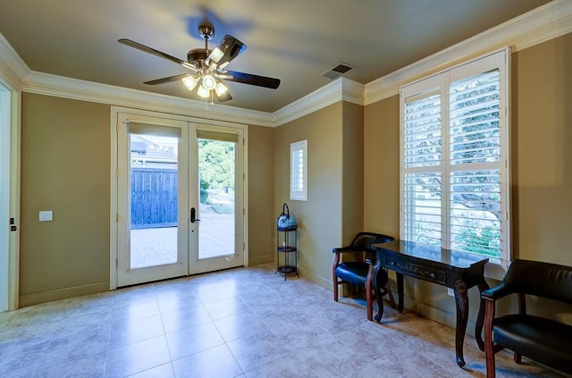 sitting room featuring crown molding, visible vents, baseboards, french doors, and a ceiling fan