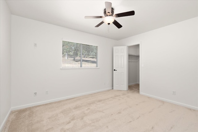 42968 Ranger Circle Dr, Coarsegold, CA 93614 - unfurnished bedroom featuring baseboards, ceiling fan, a spacious closet, and light colored carpet