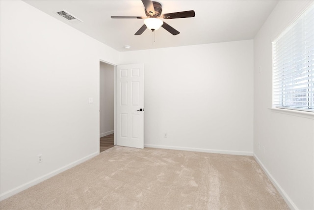 42968 Ranger Circle Dr, Coarsegold, CA 93614 - spare room with a ceiling fan, baseboards, light colored carpet, and visible vents