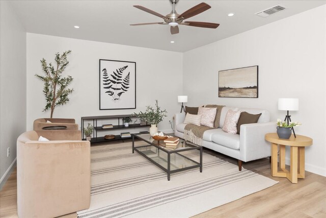42968 Ranger Circle Dr, Coarsegold, CA 93614 - living area featuring baseboards, a ceiling fan, wood finished floors, and visible vents