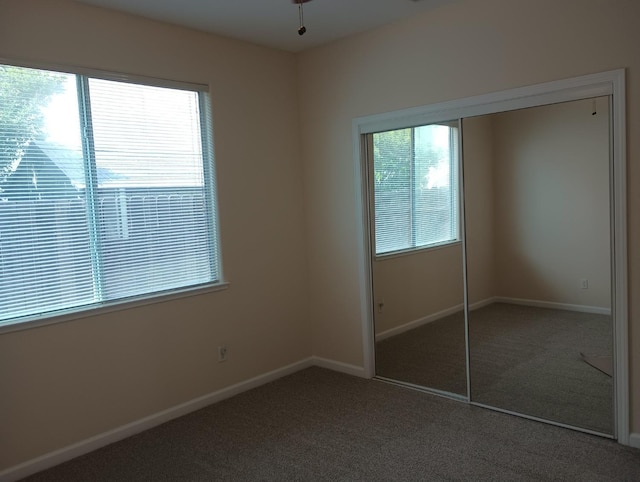2979 Duncan Ave, Clovis, CA 93611 - unfurnished bedroom featuring carpet flooring, a closet, and baseboards