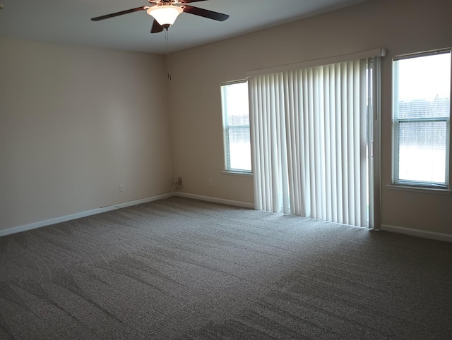 2979 Duncan Ave, Clovis, CA 93611 - empty room featuring a ceiling fan, healthy amount of natural light, carpet floors, and baseboards