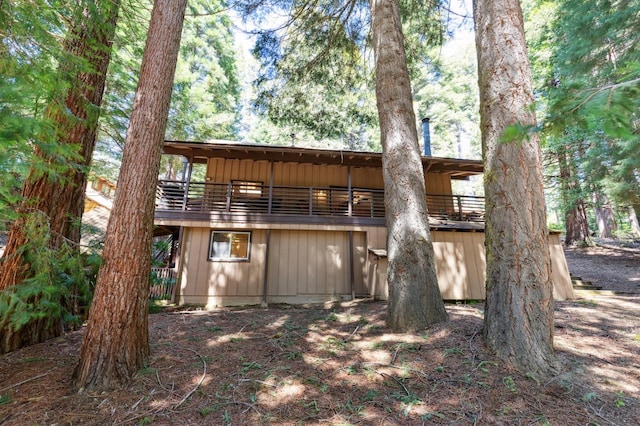 rear view of house with a balcony