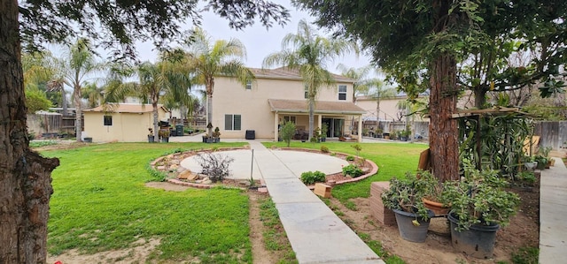 5360 E Heaton Ave, Fresno, CA 93727 - rear view of property featuring stucco siding