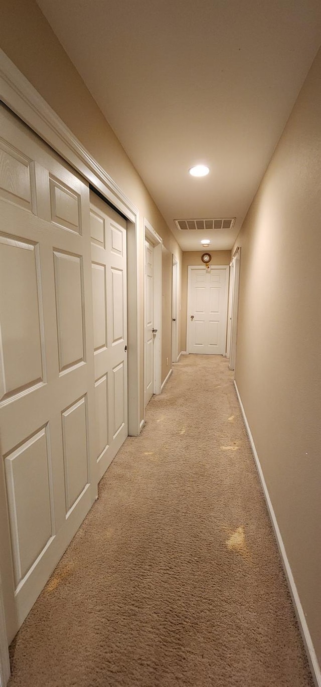5360 E Heaton Ave, Fresno, CA 93727 - hall with light colored carpet, baseboards, and recessed lighting