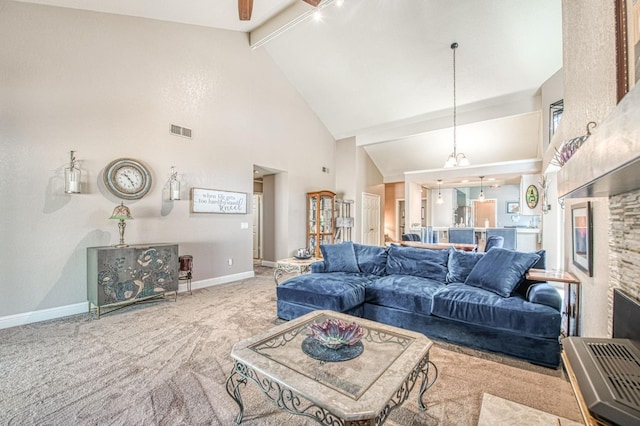 living room featuring beam ceiling, carpet floors, high vaulted ceiling, baseboards, and visible vents