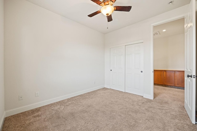 11340 N Via Verona Way, Fresno, CA 93730 - unfurnished bedroom featuring ceiling fan, light carpet, baseboards, visible vents, and a closet