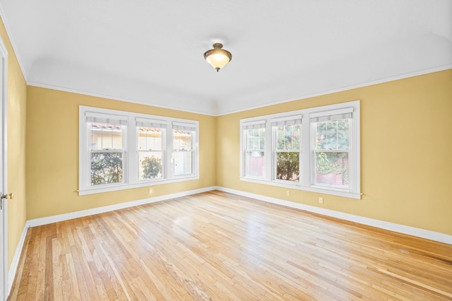2436 N Van Ness Blvd, Fresno, CA 93704 - unfurnished room with baseboards, ornamental molding, and light wood finished floors