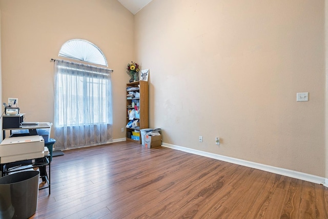 2955 E Christopher, Fresno, CA 93720 - office with baseboards, high vaulted ceiling, and wood finished floors