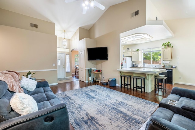 2955 E Christopher, Fresno, CA 93720 - living room featuring arched walkways, ceiling fan, dark wood-style flooring, and visible vents