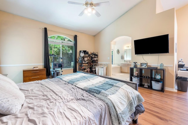 2955 E Christopher, Fresno, CA 93720 - bedroom with a ceiling fan, arched walkways, vaulted ceiling, light wood-type flooring, and ensuite bathroom