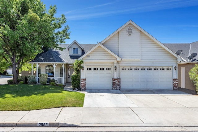 2955 E Christopher, Fresno, CA 93720 - craftsman-style home with brick siding, a garage, a porch, a front yard, and driveway