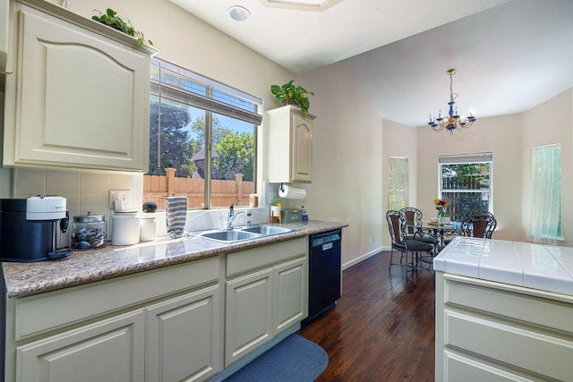 2955 E Christopher, Fresno, CA 93720 - kitchen featuring tasteful backsplash, dishwasher, a sink, an inviting chandelier, and dark wood-type flooring