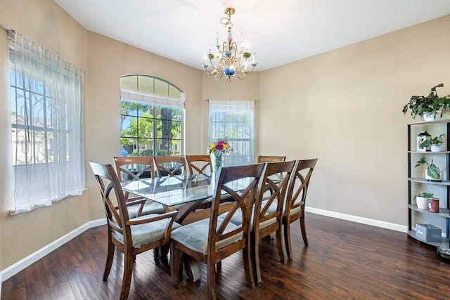 2955 E Christopher, Fresno, CA 93720 - dining space featuring dark wood-style flooring, baseboards, and an inviting chandelier