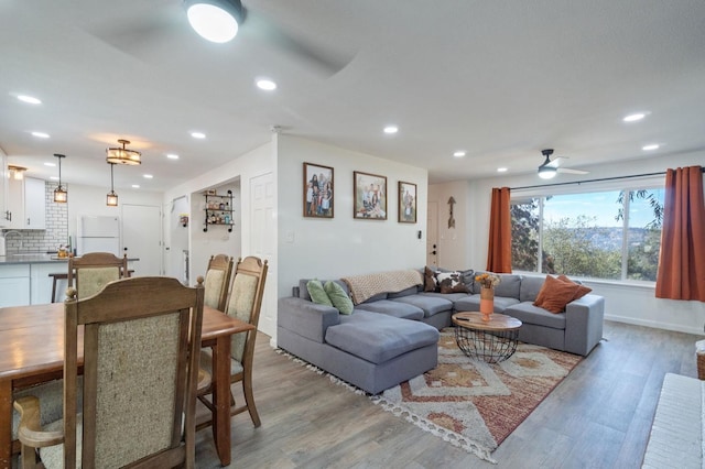 43299 Ranger Circle Dr, Coarsegold, CA 93614 - living area featuring light wood-type flooring, a ceiling fan, baseboards, and recessed lighting