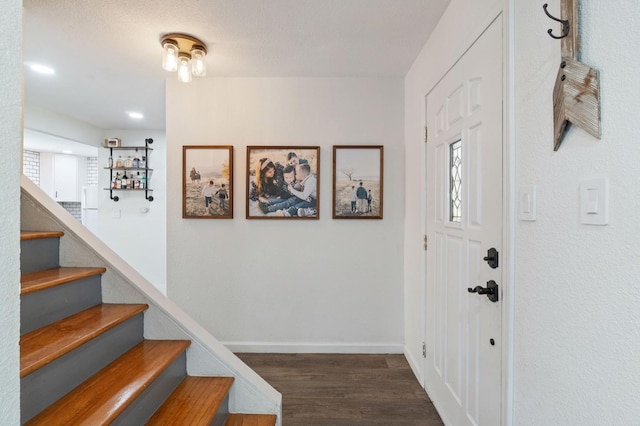 43299 Ranger Circle Dr, Coarsegold, CA 93614 - foyer featuring baseboards, dark wood-style flooring, and stairway