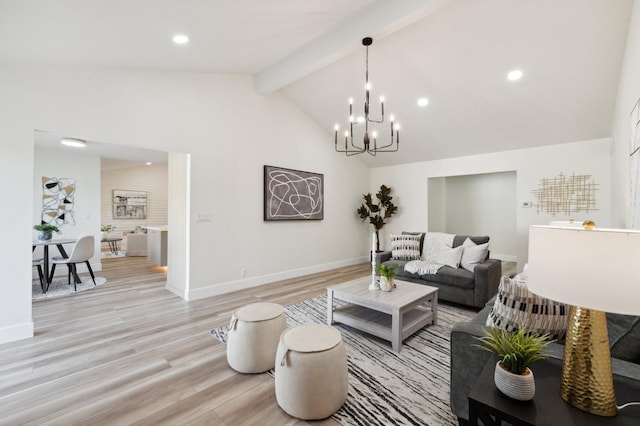 2044 W San Bruno Ave, Fresno, CA 93711 - living room featuring an inviting chandelier, high vaulted ceiling, beamed ceiling, and light wood-style flooring