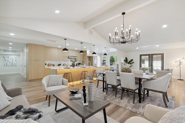 2044 W San Bruno Ave, Fresno, CA 93711 - living area featuring recessed lighting, an inviting chandelier, and light wood-style flooring