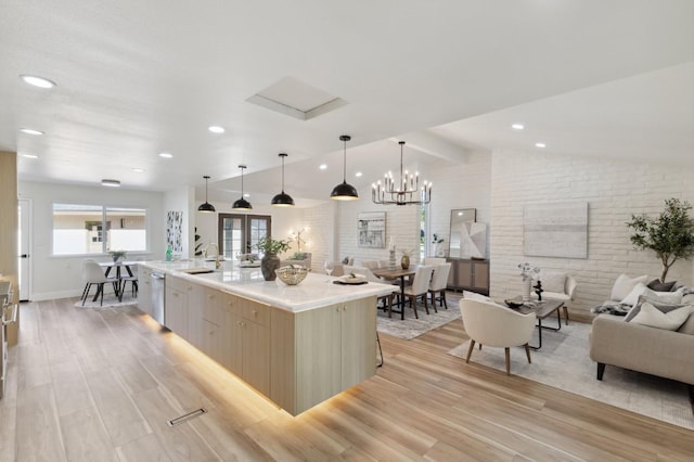 2044 W San Bruno Ave, Fresno, CA 93711 - kitchen with open floor plan, vaulted ceiling with beams, light wood finished floors, and dishwasher