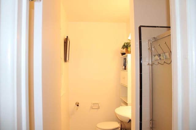 1939 S Sierra Vista Ave, Fresno, CA 93702 - bathroom with toilet, a stall shower, and a sink