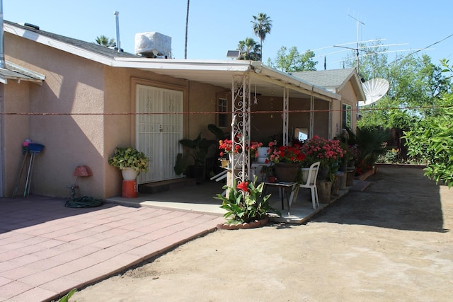 1939 S Sierra Vista Ave, Fresno, CA 93702 - rear view of property with a patio area and stucco siding