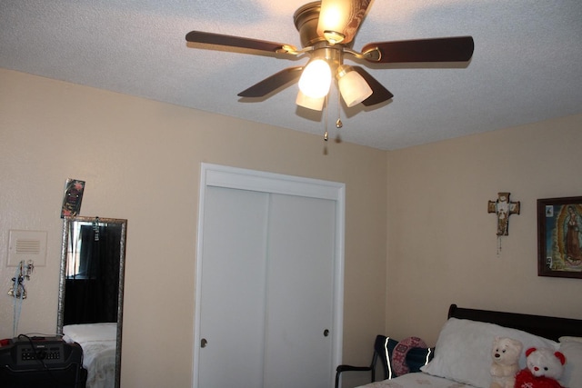 1939 S Sierra Vista Ave, Fresno, CA 93702 - bedroom with ceiling fan and a closet
