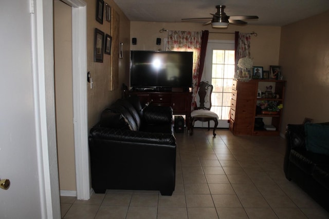 1939 S Sierra Vista Ave, Fresno, CA 93702 - living area with ceiling fan and light tile patterned flooring