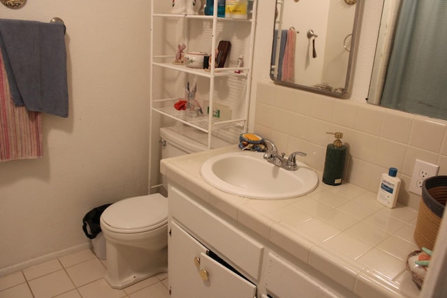 1939 S Sierra Vista Ave, Fresno, CA 93702 - full bathroom with toilet, tile patterned floors, baseboards, tasteful backsplash, and vanity
