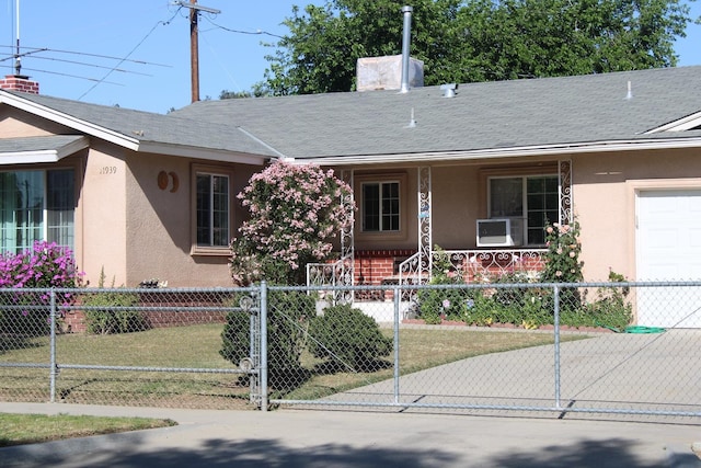1939 S Sierra Vista Ave, Fresno, CA 93702 - ranch-style home featuring covered porch, a fenced front yard, and stucco siding