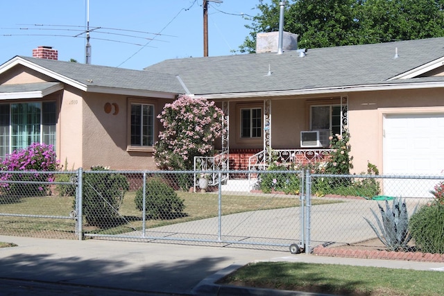 1939 S Sierra Vista Ave, Fresno, CA 93702 - ranch-style home featuring covered porch, a fenced front yard, stucco siding, and a chimney