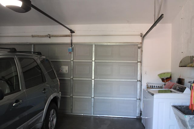 1939 S Sierra Vista Ave, Fresno, CA 93702 - garage with washing machine and clothes dryer and a garage door opener