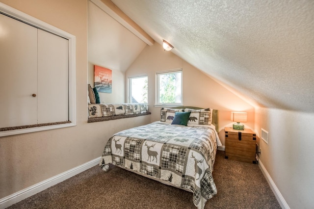 carpeted bedroom with a textured ceiling, lofted ceiling with beams, baseboards, and visible vents