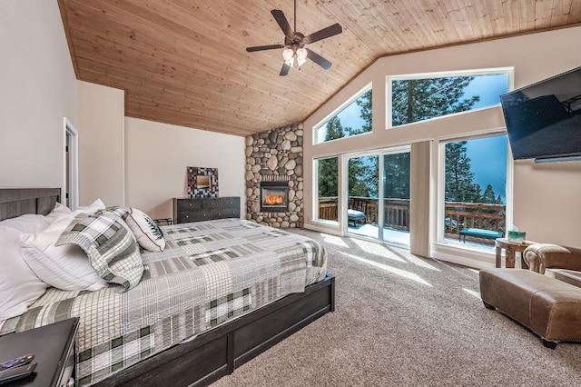 carpeted bedroom with wooden ceiling, ceiling fan, access to outside, high vaulted ceiling, and a fireplace
