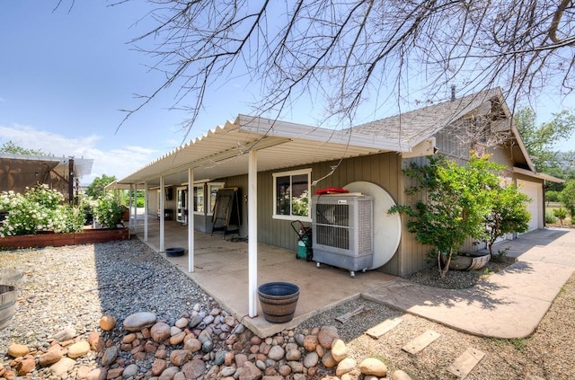 rear view of house with a patio