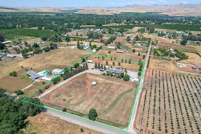 20794 E Weldon Ave, Sanger, CA 93657 - overview of rural landscape featuring abundant farmland, property boundaries highlighted, and a mountain backdrop