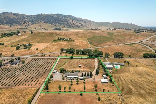 drone / aerial view with a rural view and a mountain view