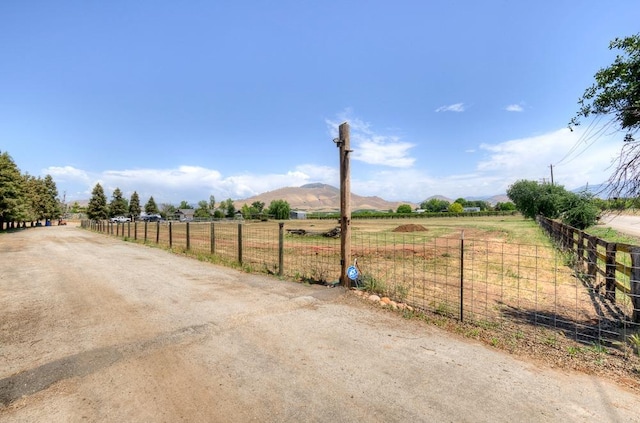 20794 E Weldon Ave, Sanger, CA 93657 - view of dirt / gravel driveway with a view of countryside and a mountain view
