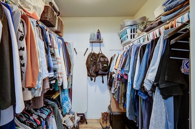 spacious closet featuring wood finished floors