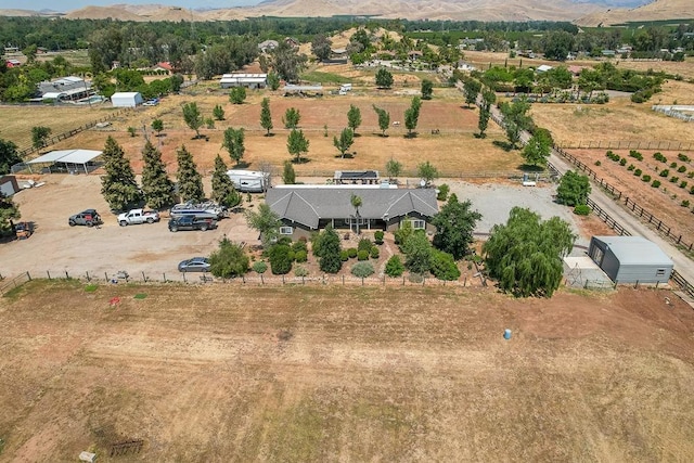 drone / aerial view with a rural view and a mountain view