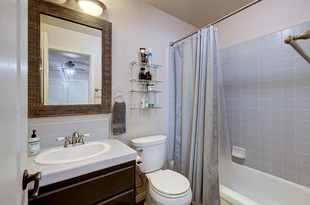 20794 E Weldon Ave, Sanger, CA 93657 - full bath featuring vanity, shower / bathtub combination with curtain, and tasteful backsplash